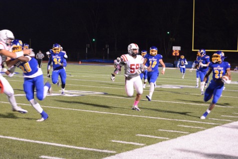 Chargers roll past Patriots in Homecoming game