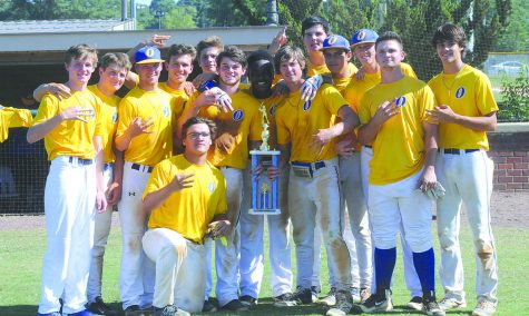 The OHS baseball team poses for a picture after winning the NEMCABB tournament.
