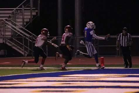 Junior wide receiver Jaquan Webb scores a touchdown against Center Hill. Webb finished with two touchdowns receiving.