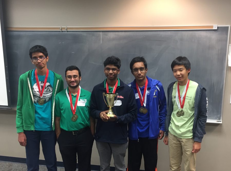 Left to right: Junior Anish Ravishankar, junior Shahbaz Gul, senior Nitin Ankisetty, junior Isuru Hewamanna, and freshman Edward Hu of the Science Bowl team pose with their trophy and medals after the Mississippi Regional Science Bowl competition on Feb. 17. 