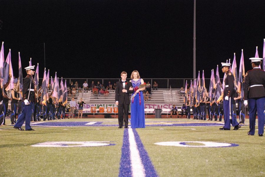 Lily+Mitchell+stands+with+escort+Cole+Moore+having+just+been+announced+Homecoming+Queen.+Mitchell+was+crowned+Thursday%2C+Oct.+5%2C+at+the+homecoming+game+against+Desoto+Central.