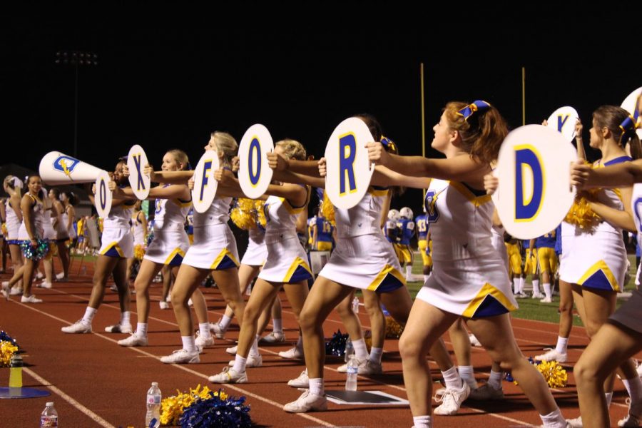 Cheerleaders+on+the+varsity+team+cheer+on+the+Chargers+at+their+game+against+Pontotoc.