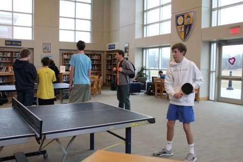Sophomore Ben Peeler competes in the I Heart Ping-Pong Tournament. He and many other students participated in the tournament on Valentines Day to help attract members for OHSs ping-pong club.