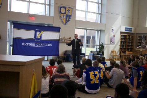 Hughes speaks to ninth grade classes about public speaking and leadership skills
