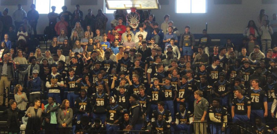 The+Oxford+Chargers+football+team+cheers+during+the+Homecoming+pep+rally+before+their+game+against+Columbus.+The+Oxford+Chargers+won+last+years+game+against+Columbus+with+a+score+of+17-7.++