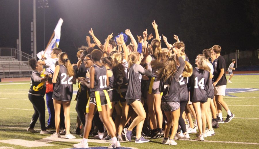 The+class+of+2020+celebrates+after+winning+the+2019+Homecoming+Powderpuff+championship.+The+seniors+beat+the+sophomores+15-12.