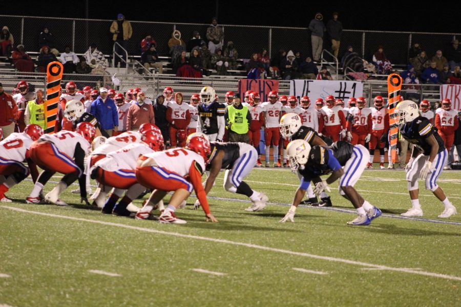 The Chargers' defense lines up against the Warren Central Vikings. The Chargers traveled to Hattiesburg to play in their first 6A Championship game. 