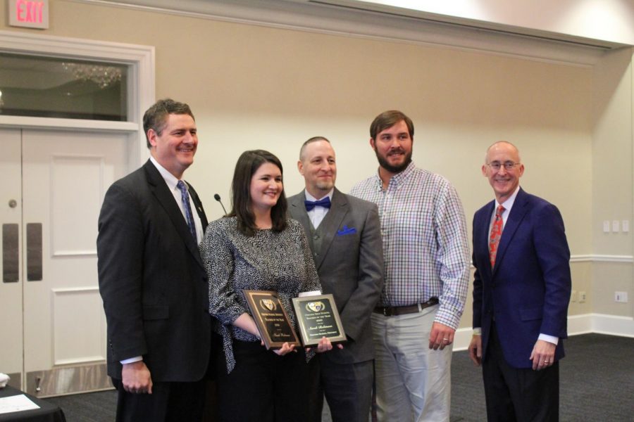 Superintendent Brian Harvey, OHS Biology teacher Sarah Robinson, OHS Principal Noah Hamilton, Cory Franks, and David Brevard, the CEO of B and B Concrete, smile with Robinsons awards. Robinson was awarded OHS and OSD Teacher of the Year at a new luncheon held by Oxford community members and donors.