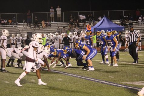 The Charger defense lines up during a play at the jamboree game against Horn Lake on Friday, August 20.