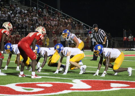 The Chargers prepare for a play against the Lafayette High School Commodores on September 17. The Chargers lost the game 32-23.