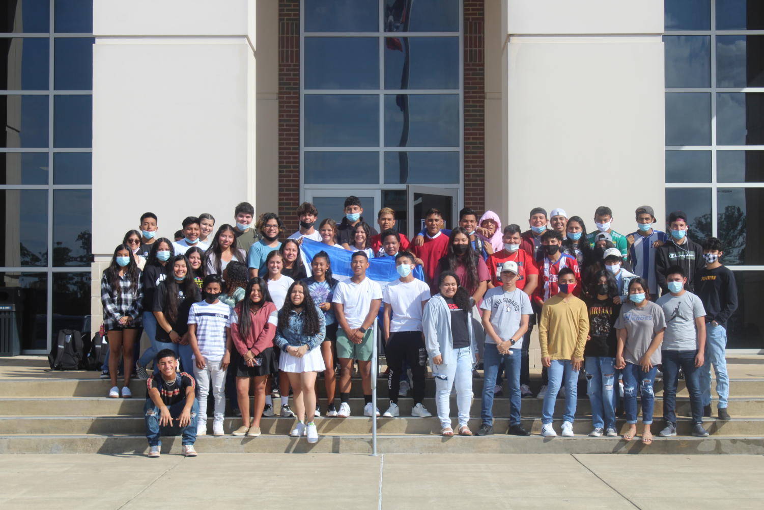 OHS students with Hispanic Heritage stand together to honor Hispanic Heritage month. The native student countries represented in this picture are mostly Honduras, Guatemala, and Mexico, while certain heritage lines trace back to many other countries. 77 Oxford students have Hispanic Heritage, but not all were present for this picture.