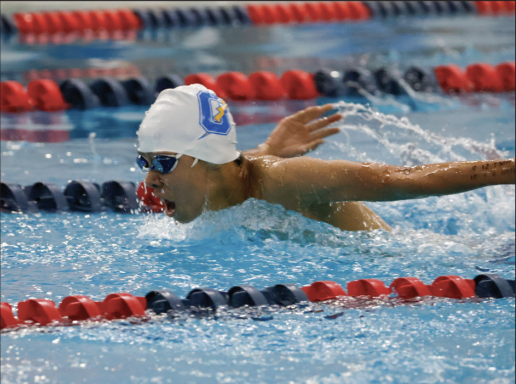 Sophomore Noah Stevens swims the butterfly stroke at the Oxford Invitational. This was swim’s first meet of the season where they placed third overall.